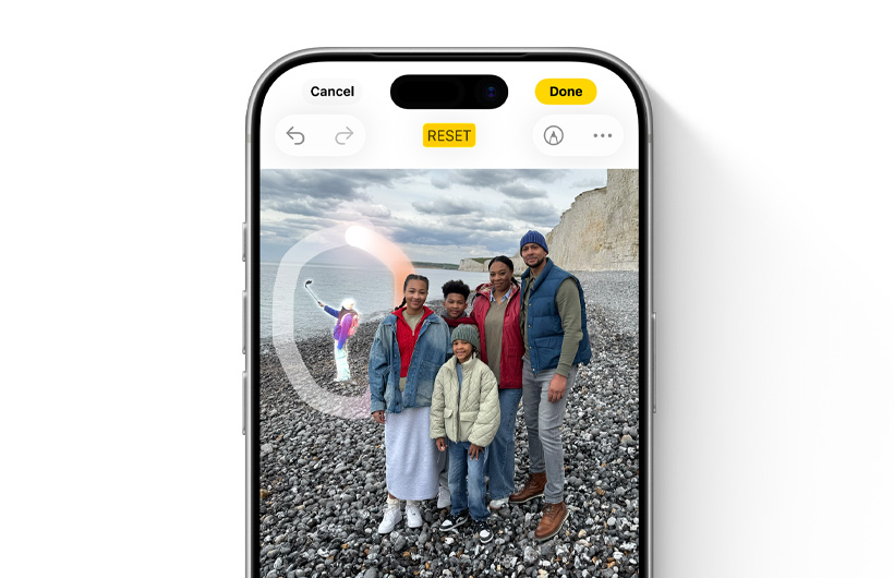 UI of the Clean Up experience shows a highlighted object in the background of a photo selected to remove