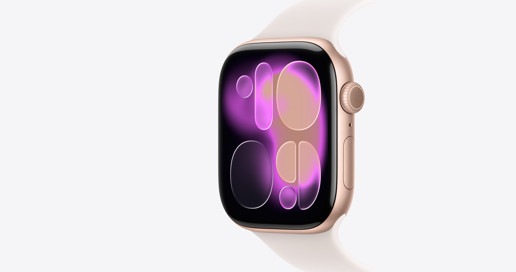 Apple Watch Series 11‏، لون ذهبي وردي، إطار ألومنيوم، واجهة الساعة Responsive Art، الجزء الخارجي الأيمن، التاج الرقمي‏، ميكروفون، الزر الجانبي، حزام رياضي بلون خوخي متورد