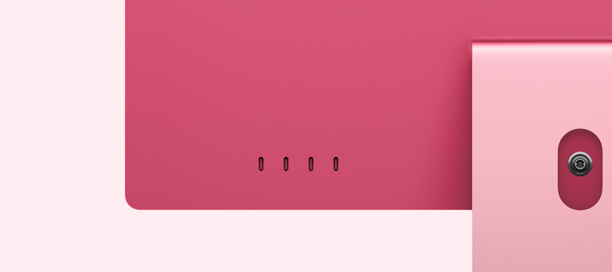 iMac rose vu de dos, avec quatre ports USB-C.